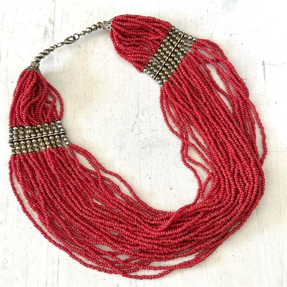 Red beaded multi strand silver tone statement necklace